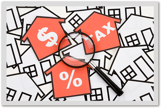 Image Of Red Houses With A Dollar Sign, A Percent Sign, - Land Value Tax (600x419)