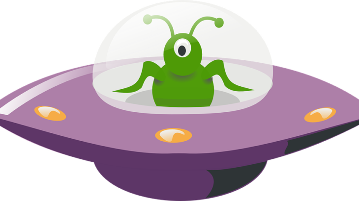 An Alien Piloting A Flying Saucer - Ufo Clipart (730x410)