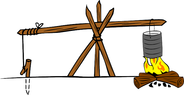 Campfire Cooking Crane - Ancient Clay Popcorn Popper Cooking On A Fire (640x332)