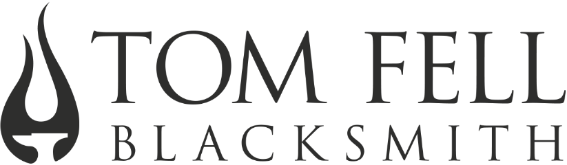 Tom Fell - Blacksmith - Travellers International Hotel Group Inc Logo (823x240)