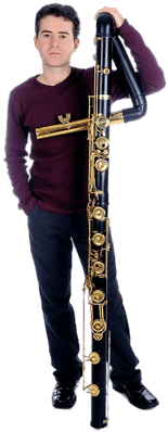 Musician Holding Contrabass Flute - Flauta Contrabajo (400x400)