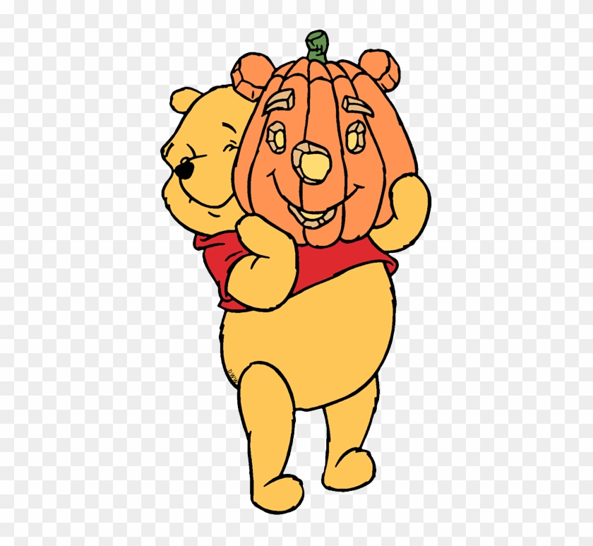 Clip Art Of Winnie The Pooh Holding A Jack O' Lantern - Cartoon #1687130